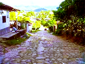 Honduras Copán – Single Origin Coffee from Micro-Lot Farmers Cobbled street and homes in the Copán region of Honduras, where Ricco Coffee sources its single origin coffee from small-scale farmers in high-altitude micro-lots