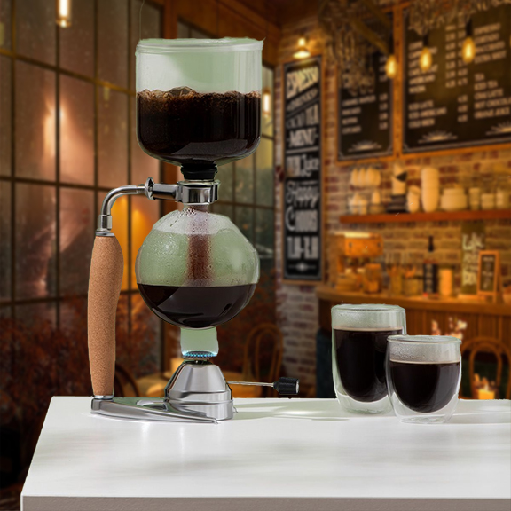 A Bodum siphon vacuum coffee maker, in full brew, set against the backdrop of a cozy coffee shop, with two cups of freshly brewed coffee waiting to be enjoyed, highlighting the craft of coffee making.