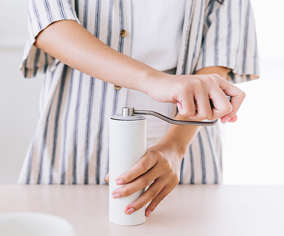Three pour-over brew stations set for a barista competition, highlighting the precision and skill in pour-over technique as competitors aim to extract the perfect flavor profile from single-origin beans.